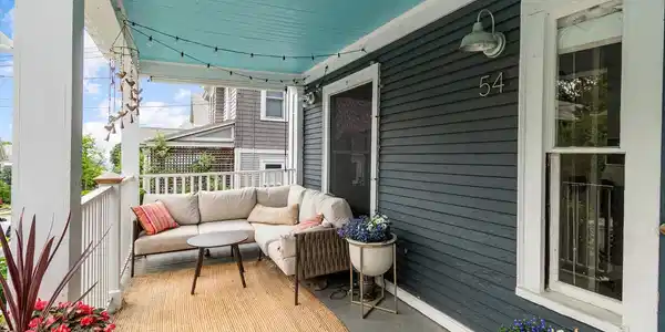 Image 2: Cozy front porch w/ lake views