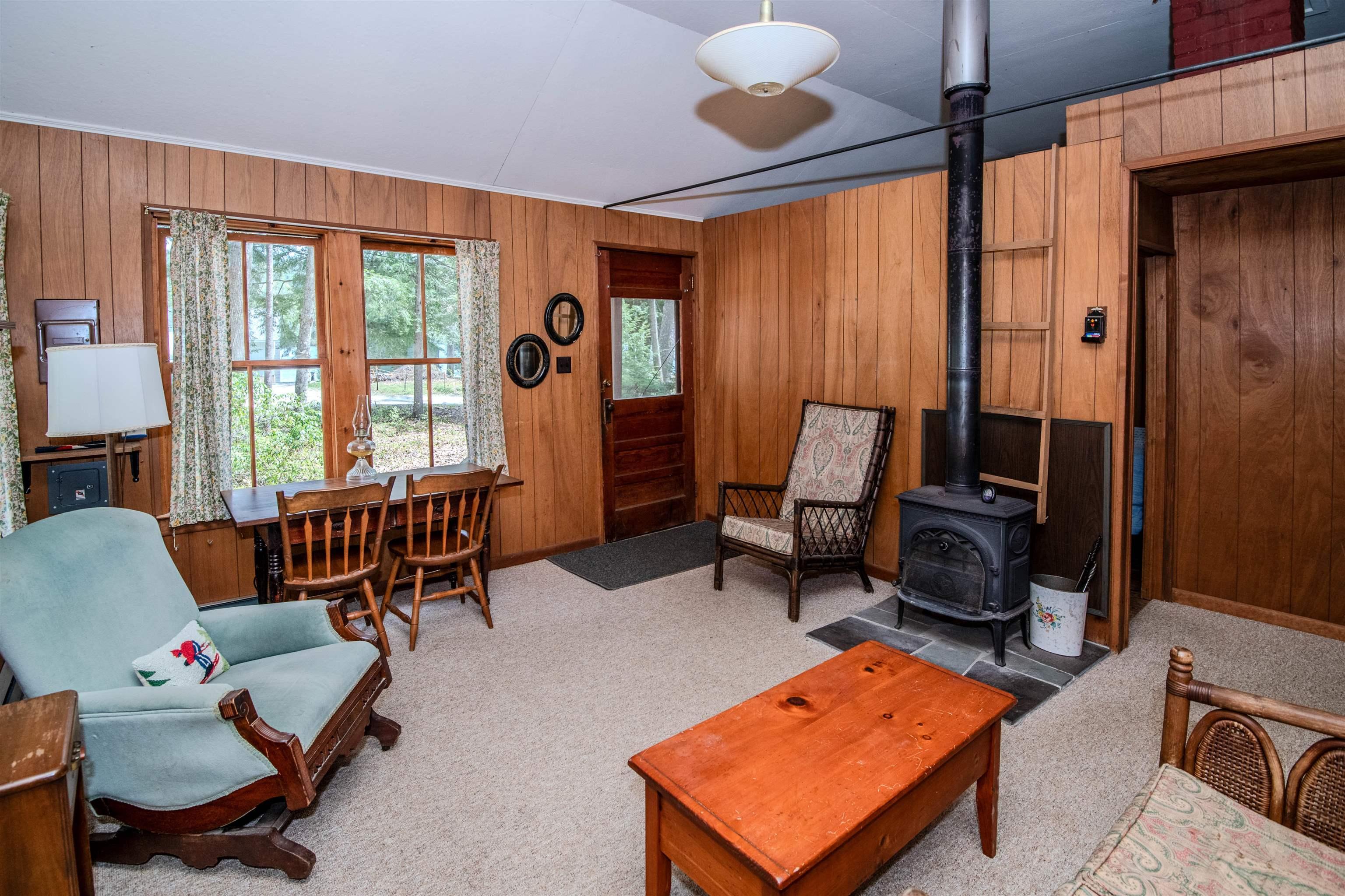 Image 3: Living Room with Stove Image 3: Living Room with Stove
