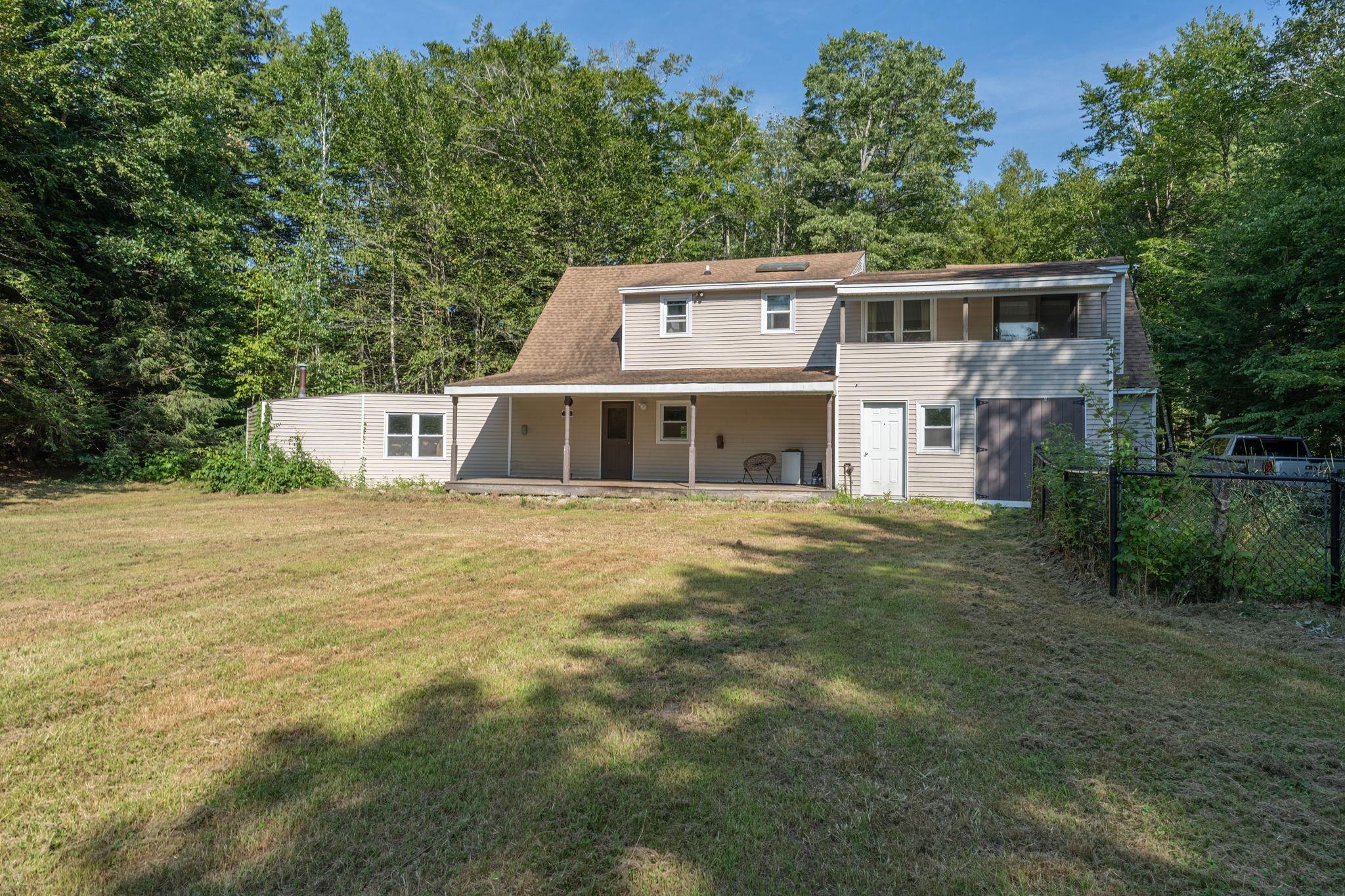 Image 3: Large fenced in backyard