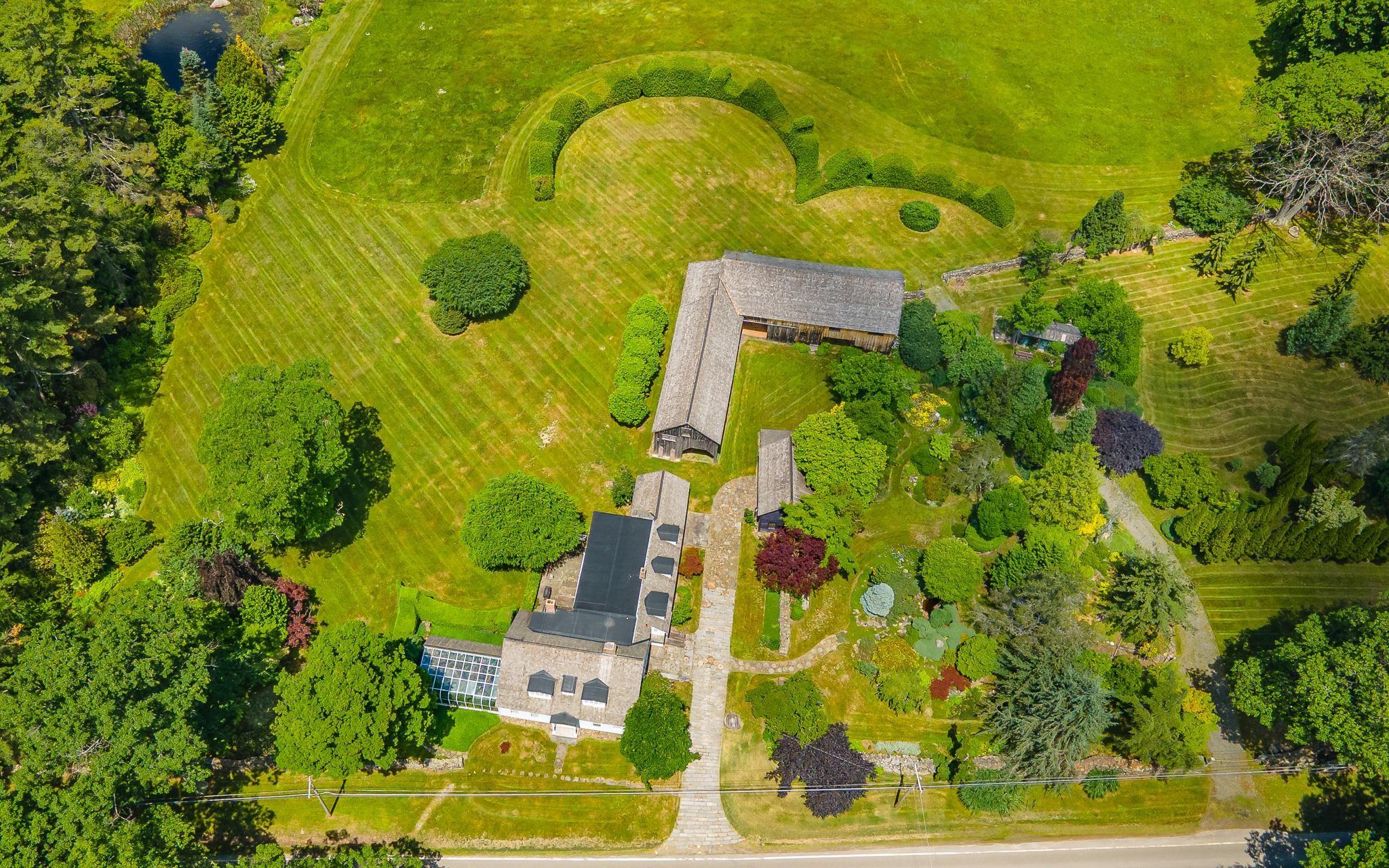 Image 3: Aerial of buildings & house