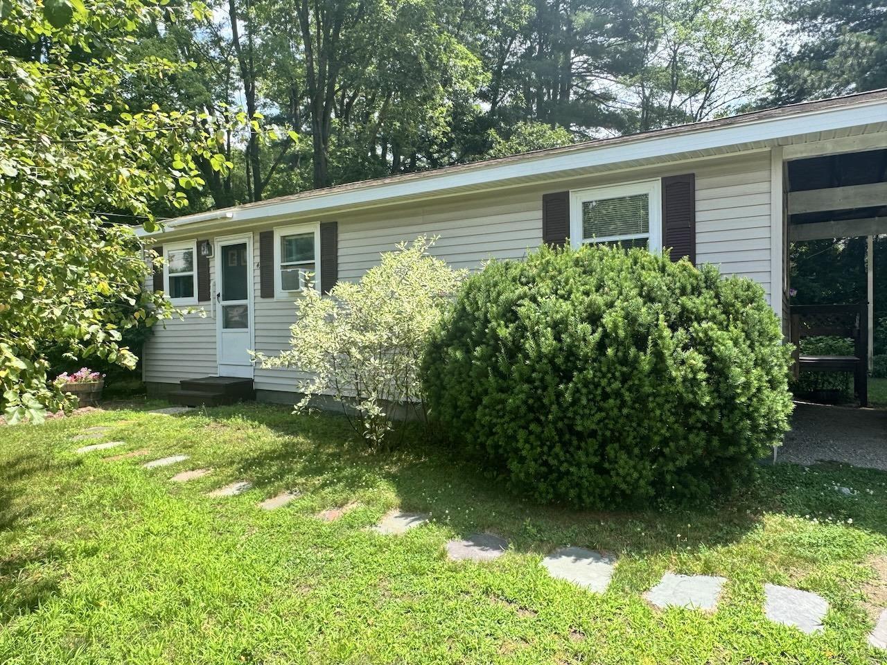 Image 3: Front View With Carport