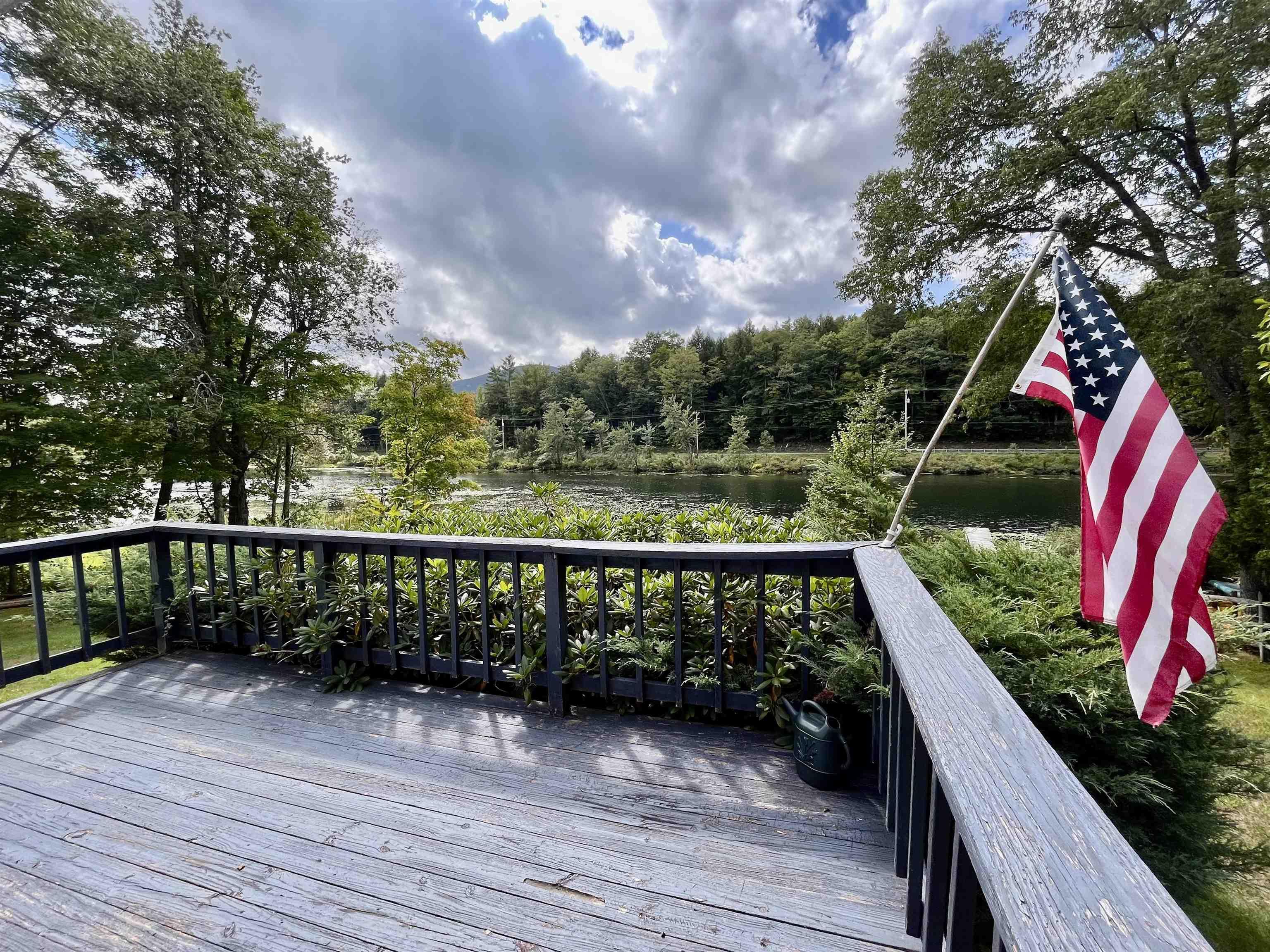 Image 2: Large Deck Overlooking the Lake and Yard