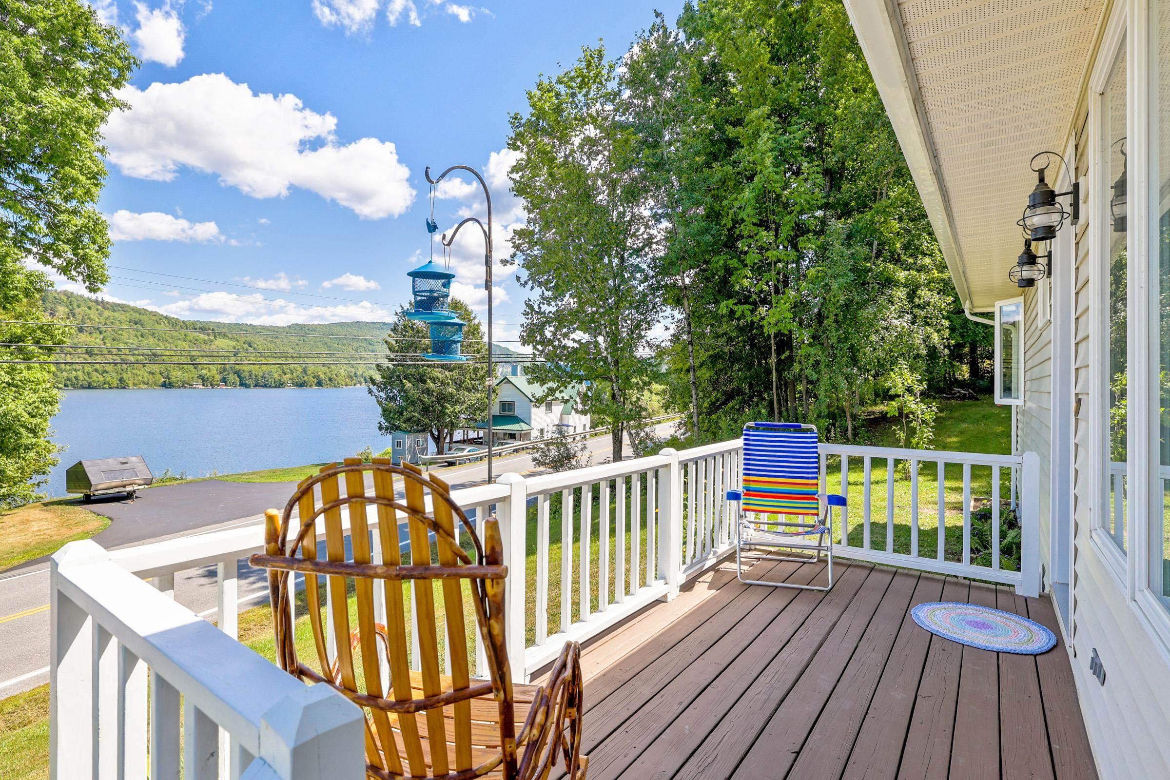 Image 2: porch overlooks Lake