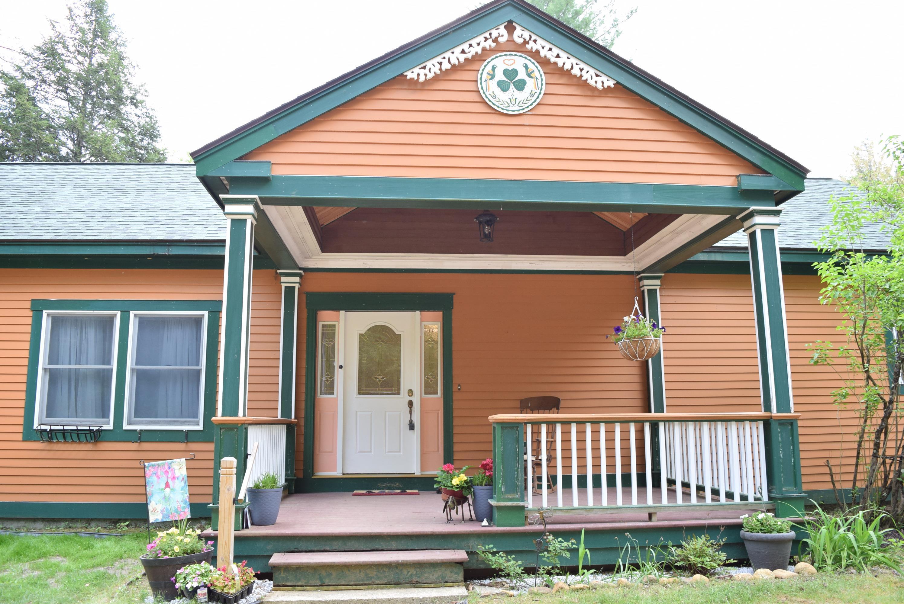 Image 1: Trex flooring, Covered entrance porch with electricity, Front Porch