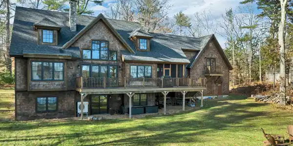 Image 3: Lakeside with decks and windows to enjoy it all Image 3: Lakeside with decks and windows to enjoy it all