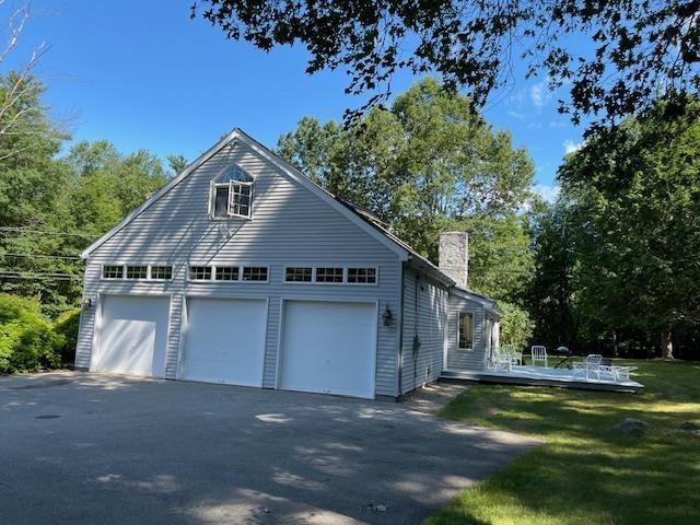 Image 3: 3 car garage with extra high ceilings