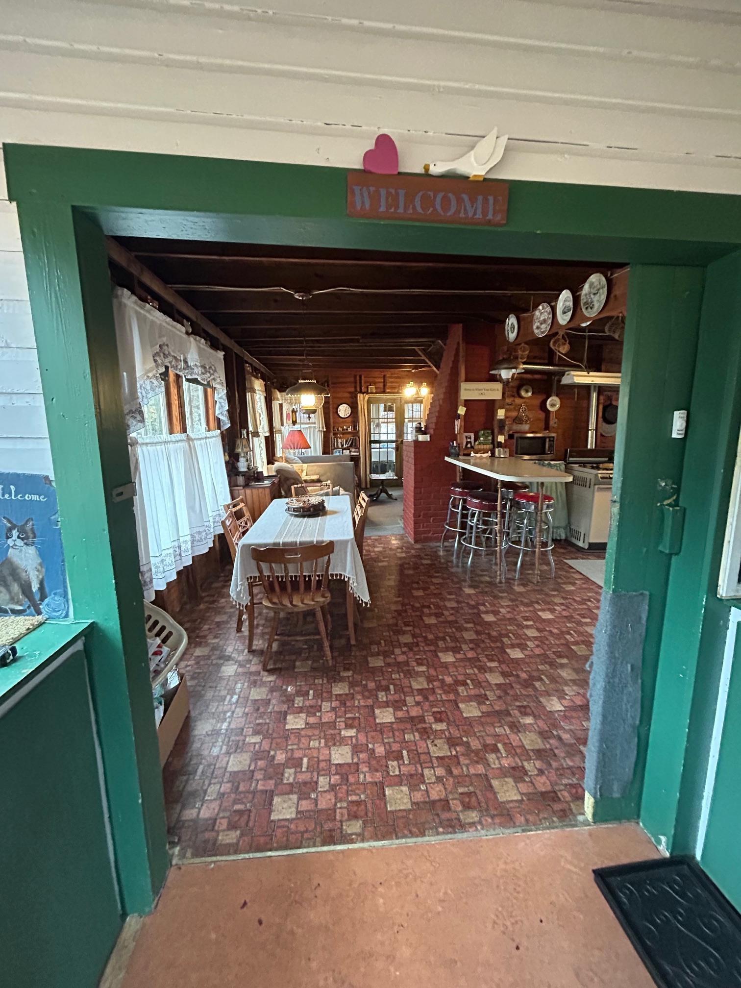 Image 4: Dining to Living to Screen porch Image 4: Dining to Living to Screen porch