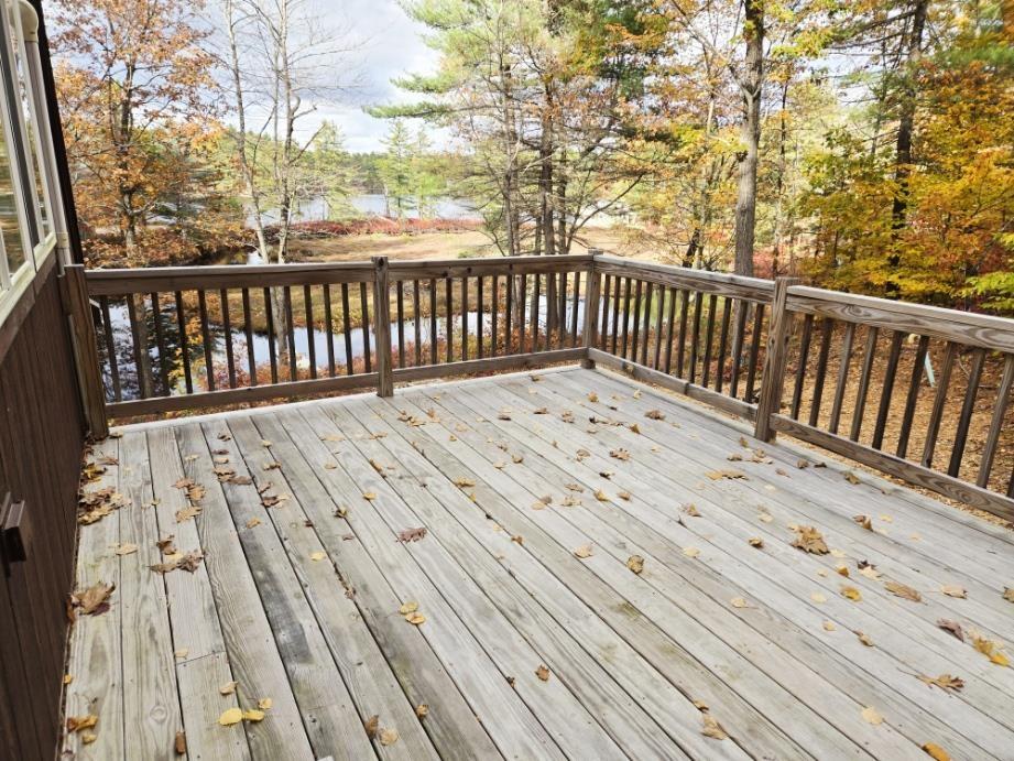 Image 4: Large Deck Overlooking the Water Image 4: Large Deck Overlooking the Water