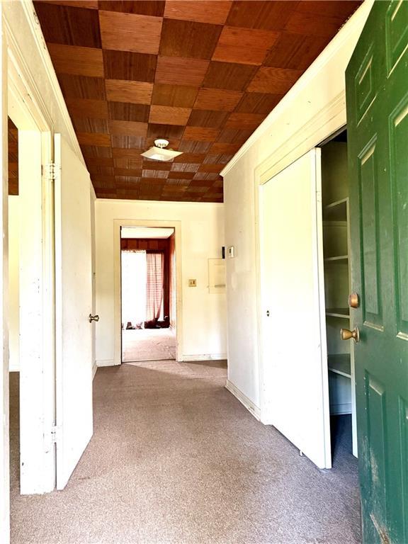 Image 3: Enter the home into the foyer with a spacious coat
