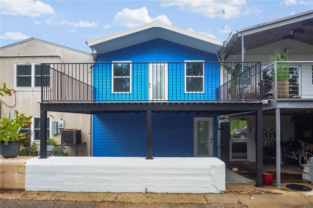 Image 1: FRONT VIEW OF THE BEAUTIFUL BOATHOUSE