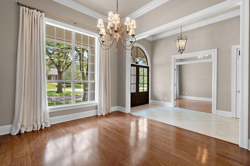 Image 2: FORMAL DINING ROOM /HARDWOOD FLOORS.