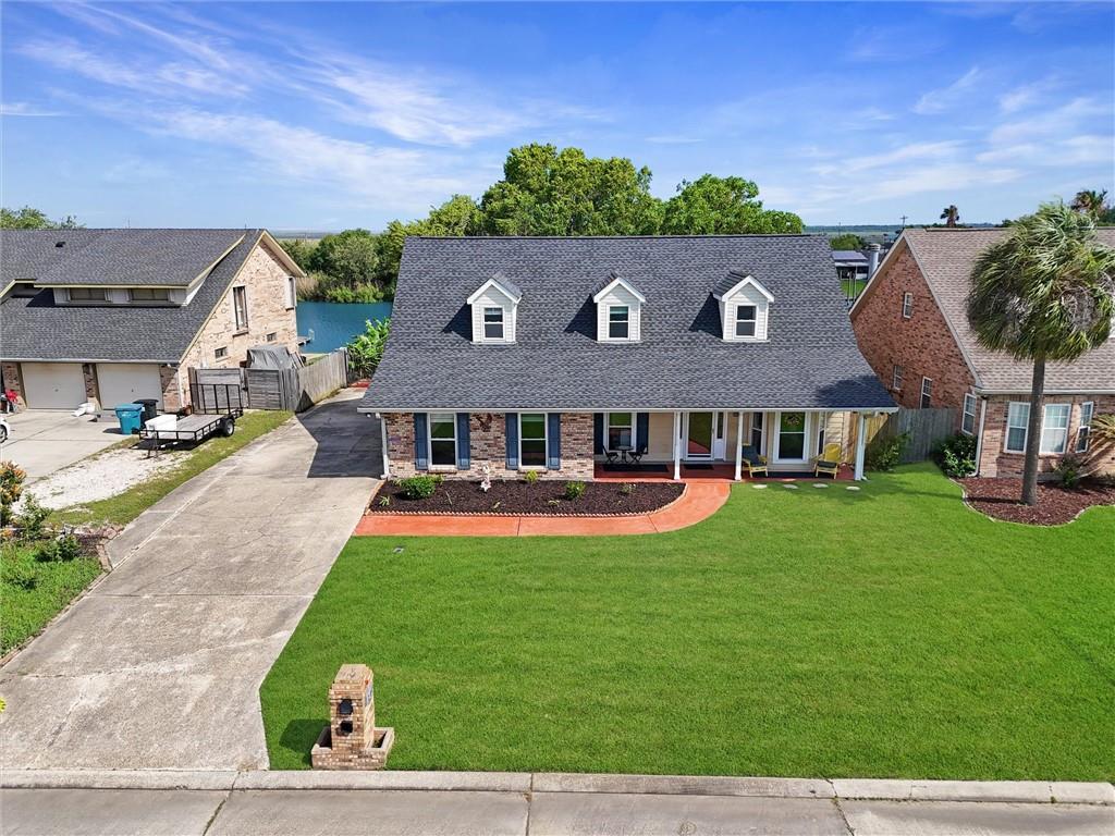 Image 2: Front of home faces Moonraker Lake with unobstruct