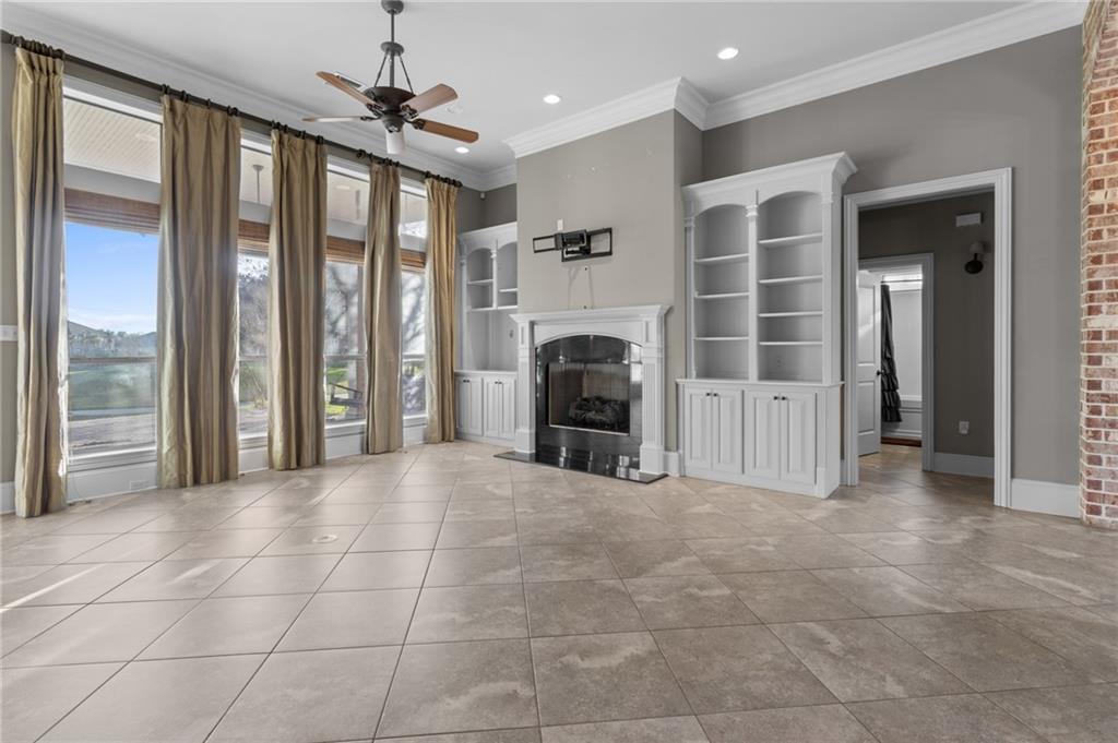Image 3: Dramatic Floor To Ceiling Windows.