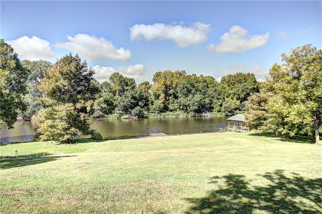 Image 2: River view with dock