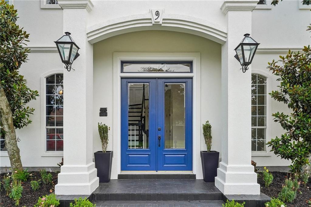 Image 2: Welcomes by 2 gas lanterns & a cozy front porch