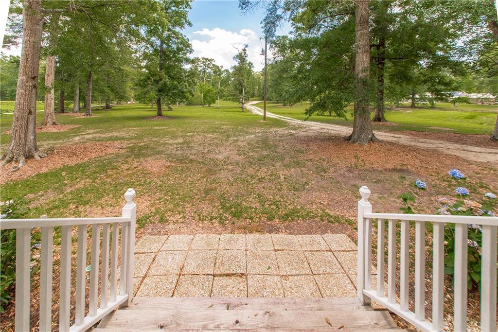 Image 2: Nice walkway to fantastic porch