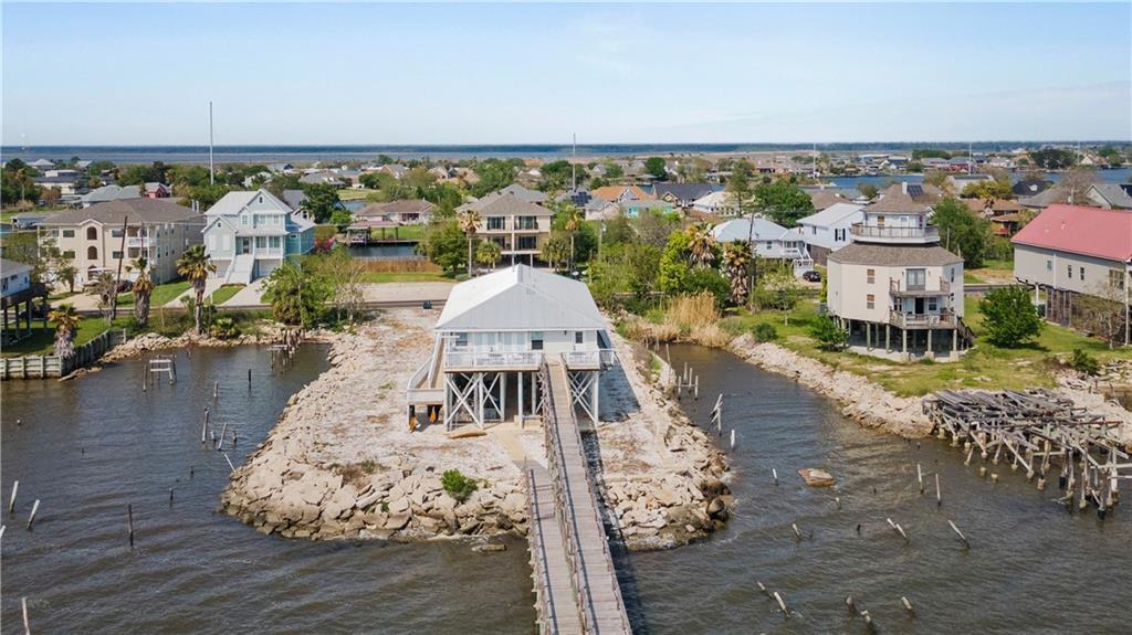 Image 4: A view of the property from the water.