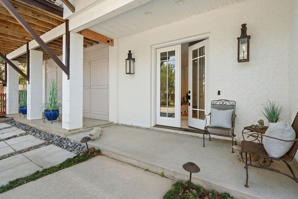 Image 2: Front doors. Brick exterior for easy mainenance.