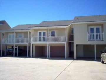 Image 2: Front featuring the covered carport