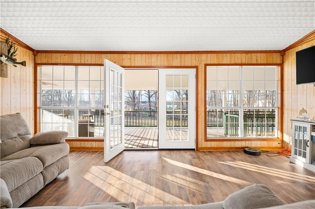 Image 2: Living Room overlooking the from porch