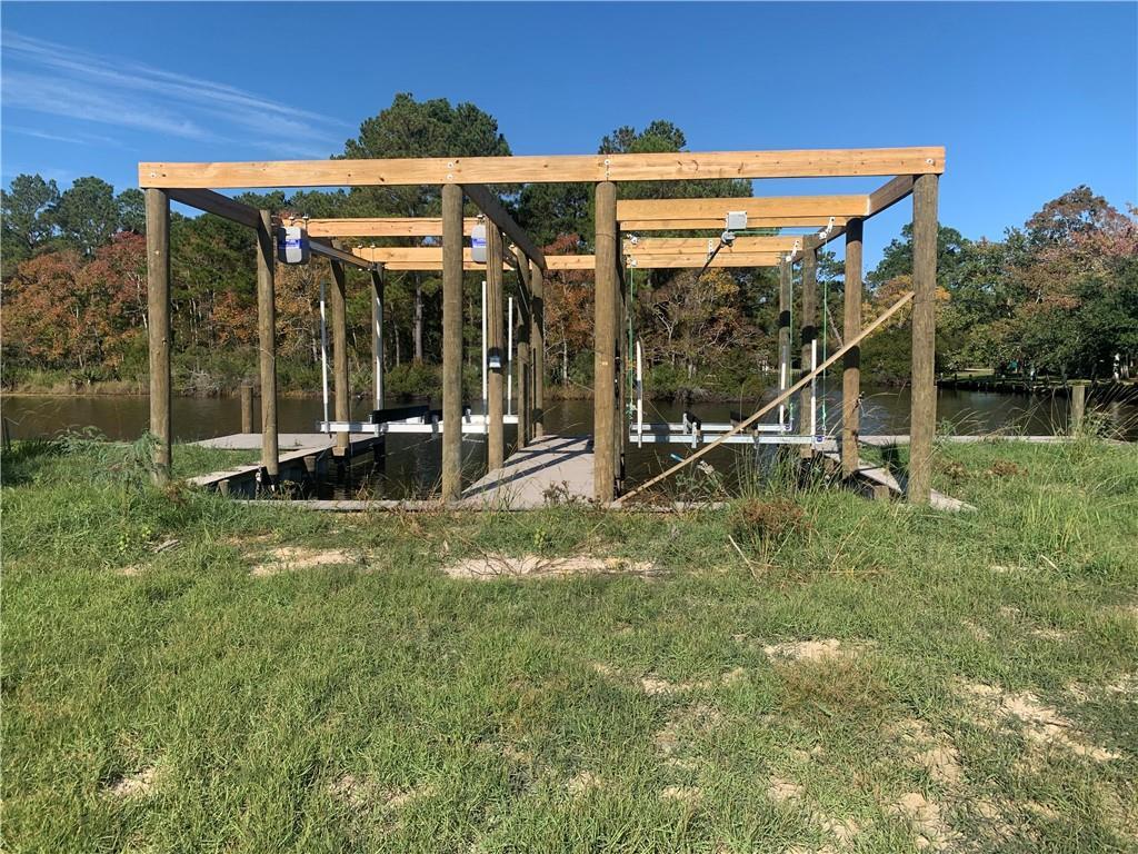 Image 2: Custom Double Boat Dock, Lift with motors and Bulk