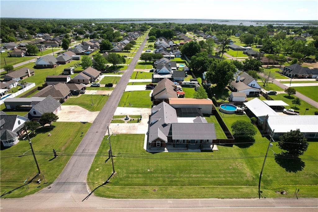 Image 4: Neighborhood aerial view surrounding 102 S Bayou E