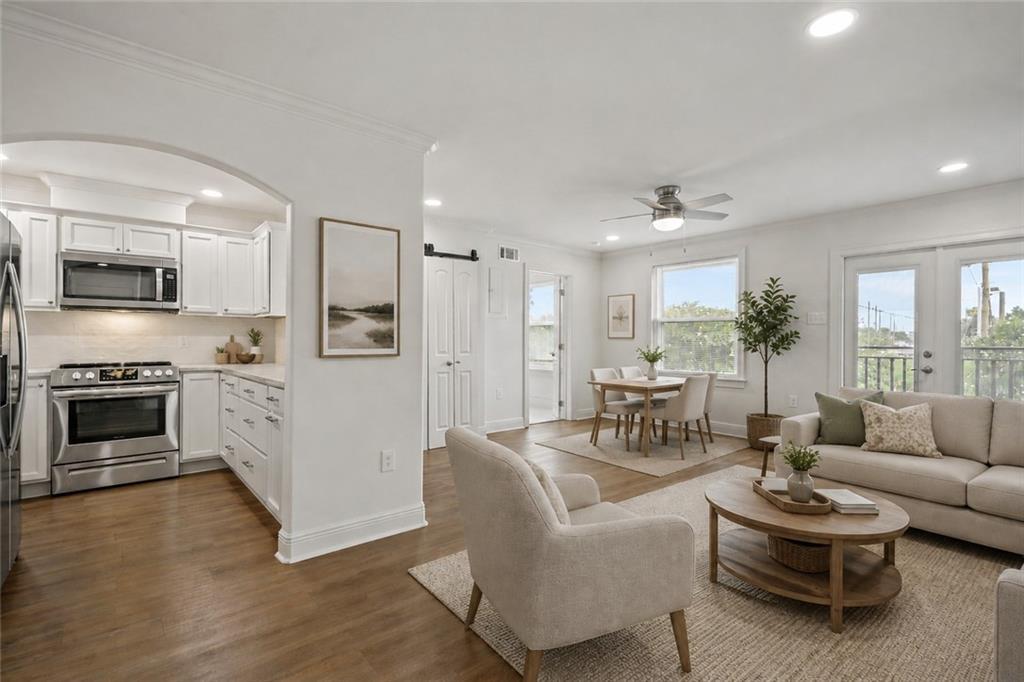 Image 3: Virtually Staged Living/Dining Area
