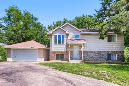 6032 Upper 51st Street N