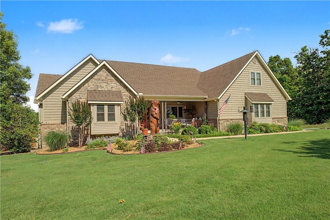 Image 2: Generous and professionally landscaped front yard.