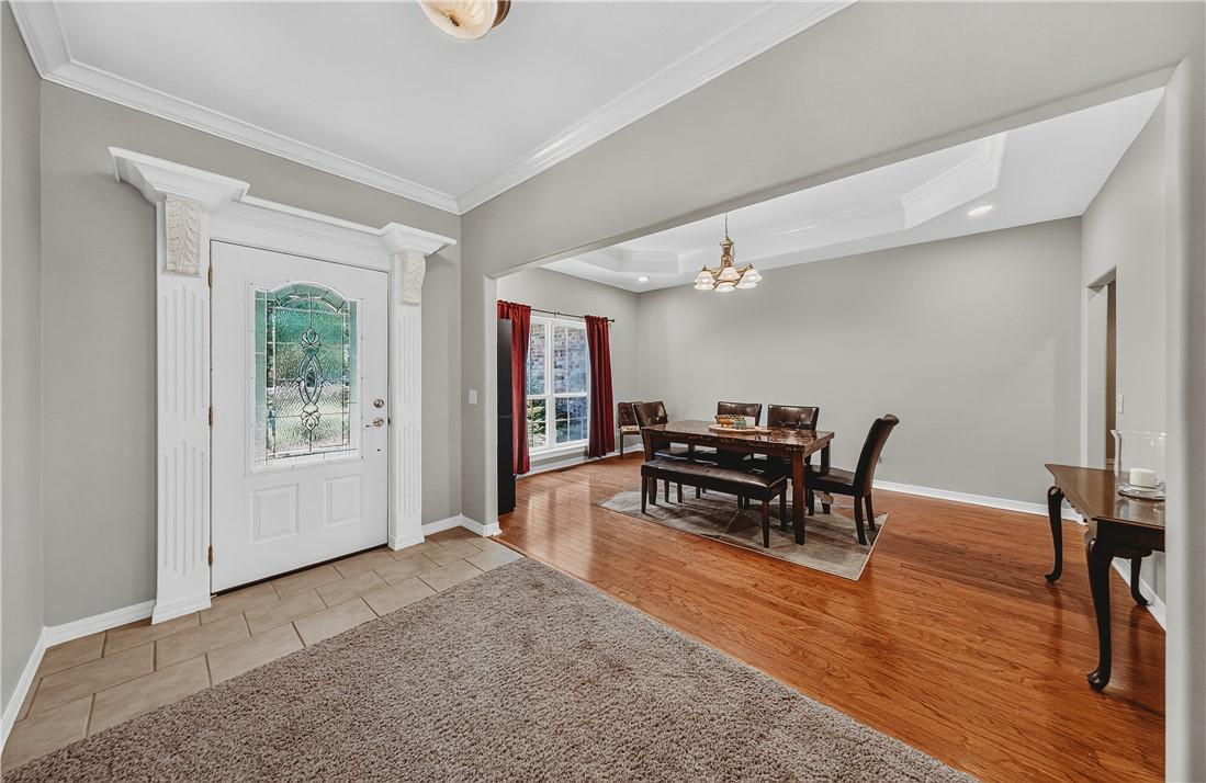 Image 2: Upon entering there is an open entryway and the ro