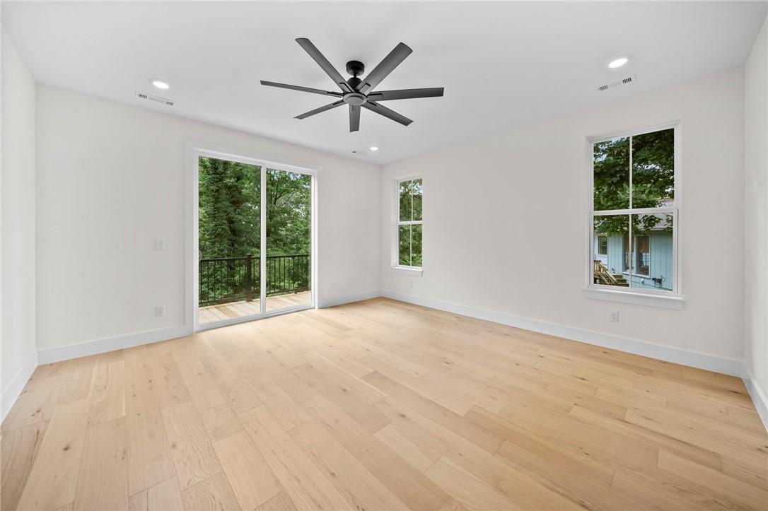 Image 4: Primary Suite on the Main Level