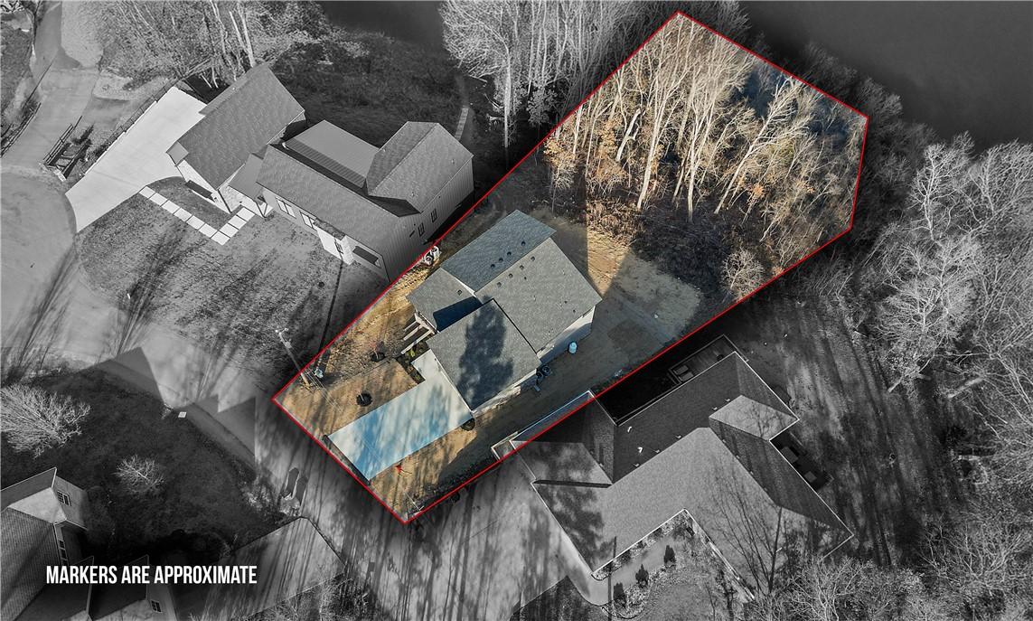 Image 3: Aerial view of property and surrounding area with