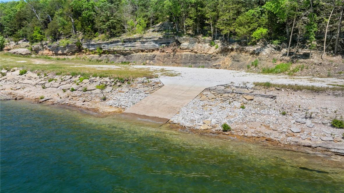 Image 3: Private 20 foot boat ramp providing direct water a