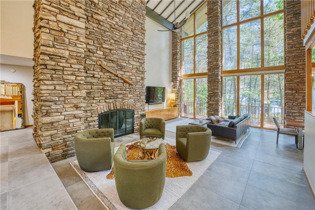Image 2: Soaring 28.5-foot floor-to-ceiling windows w/ slat