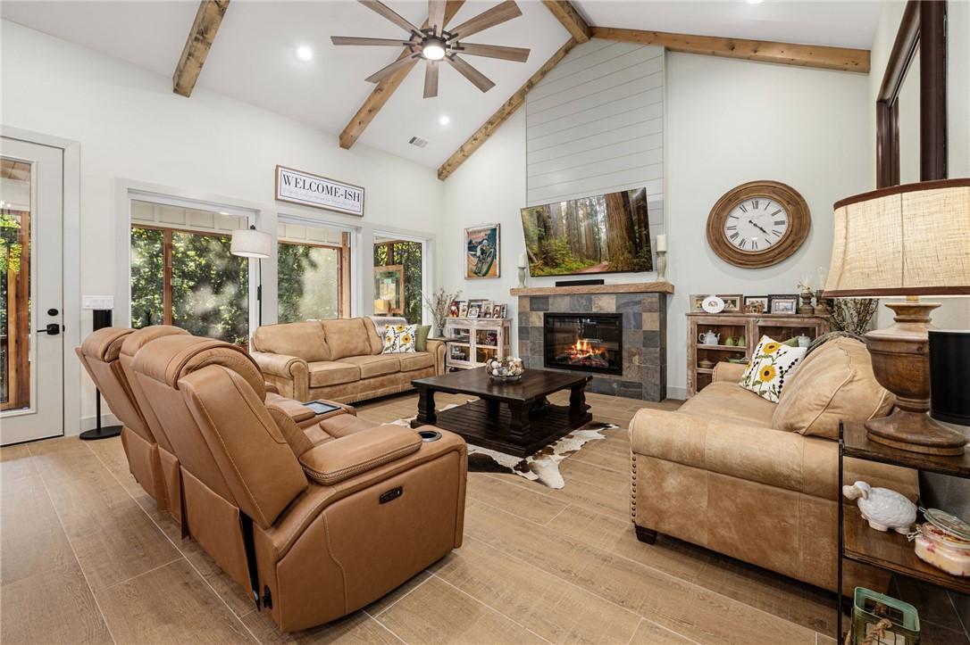 Image 2: Vaulted ceilings in the living room are complete w