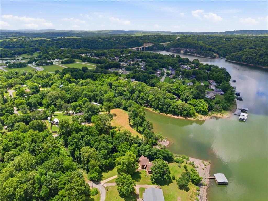 Image 3: Expansive waterfront property featuring a private