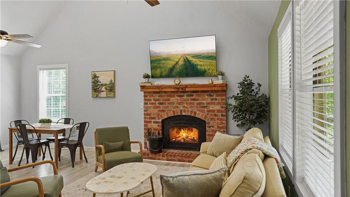 Image 1: Beautiful living room with cozy fireplace