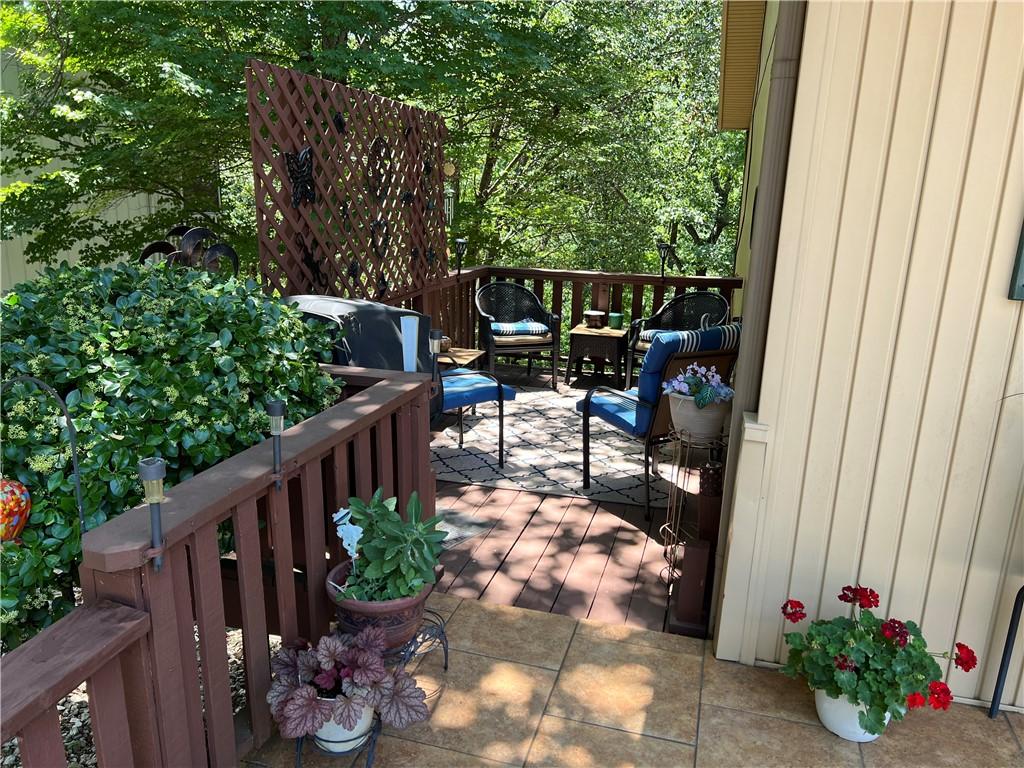 Image 4: Private side deck and sitting area is shaded most
