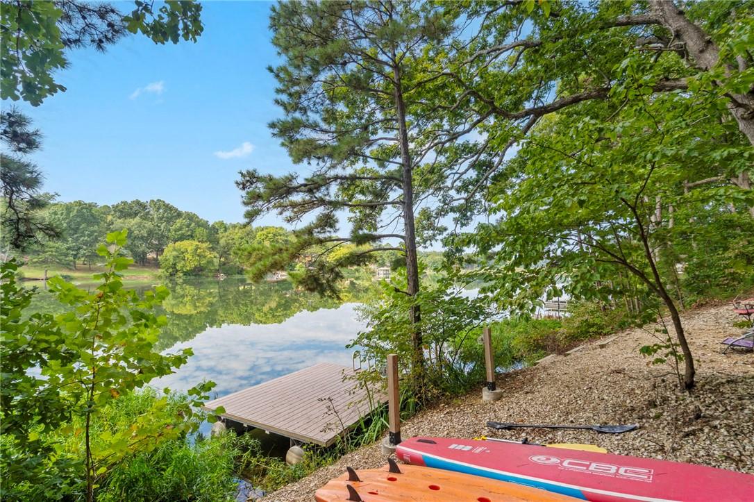 Image 2: Peaceful waterfront setting with private dock.