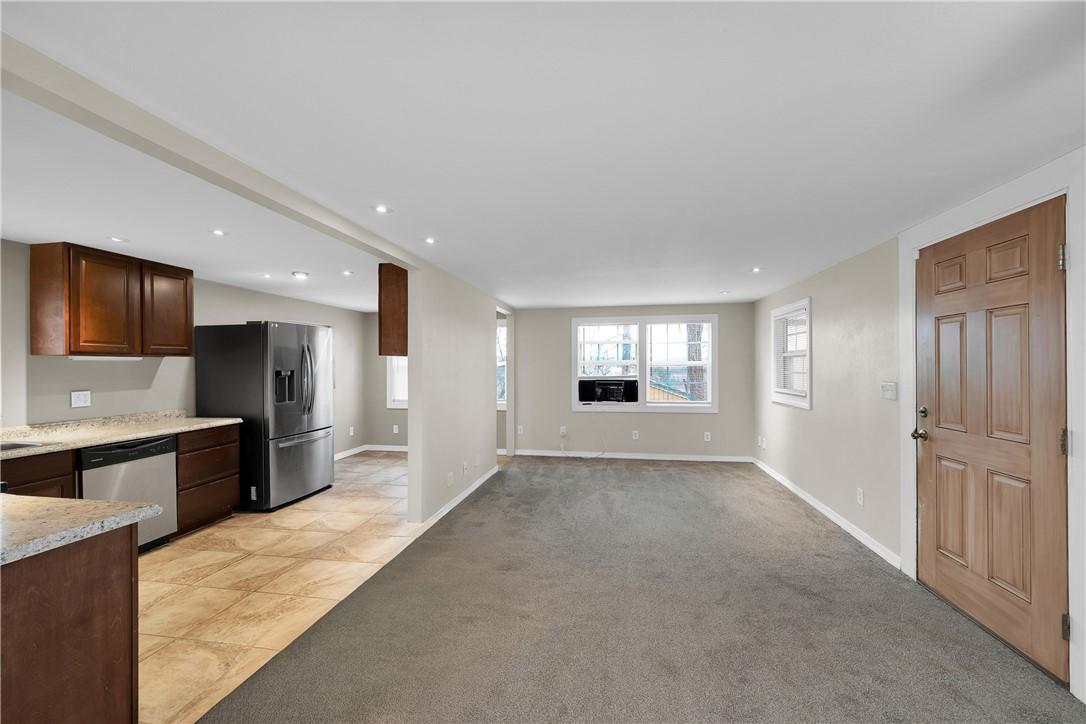 Image 3: View of Living Room/Kitchen