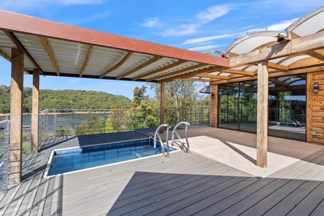 Image 1: Who doesnt want a view of the lake from your plung