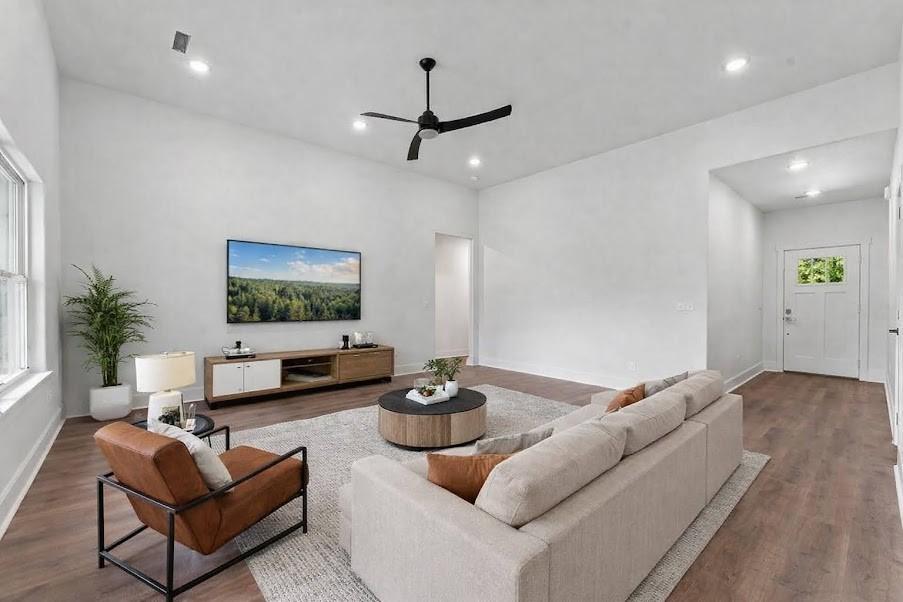 Image 4: Living room with wood finished floors, a ceiling f