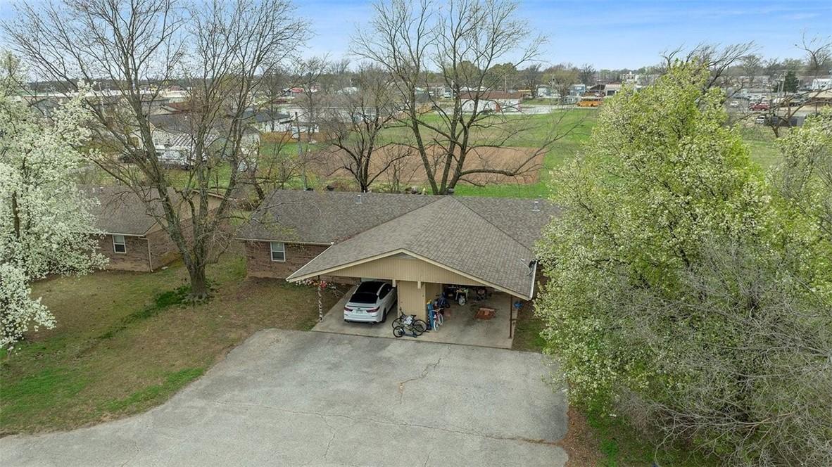 Image 2: Aerial view of property and surrounding area