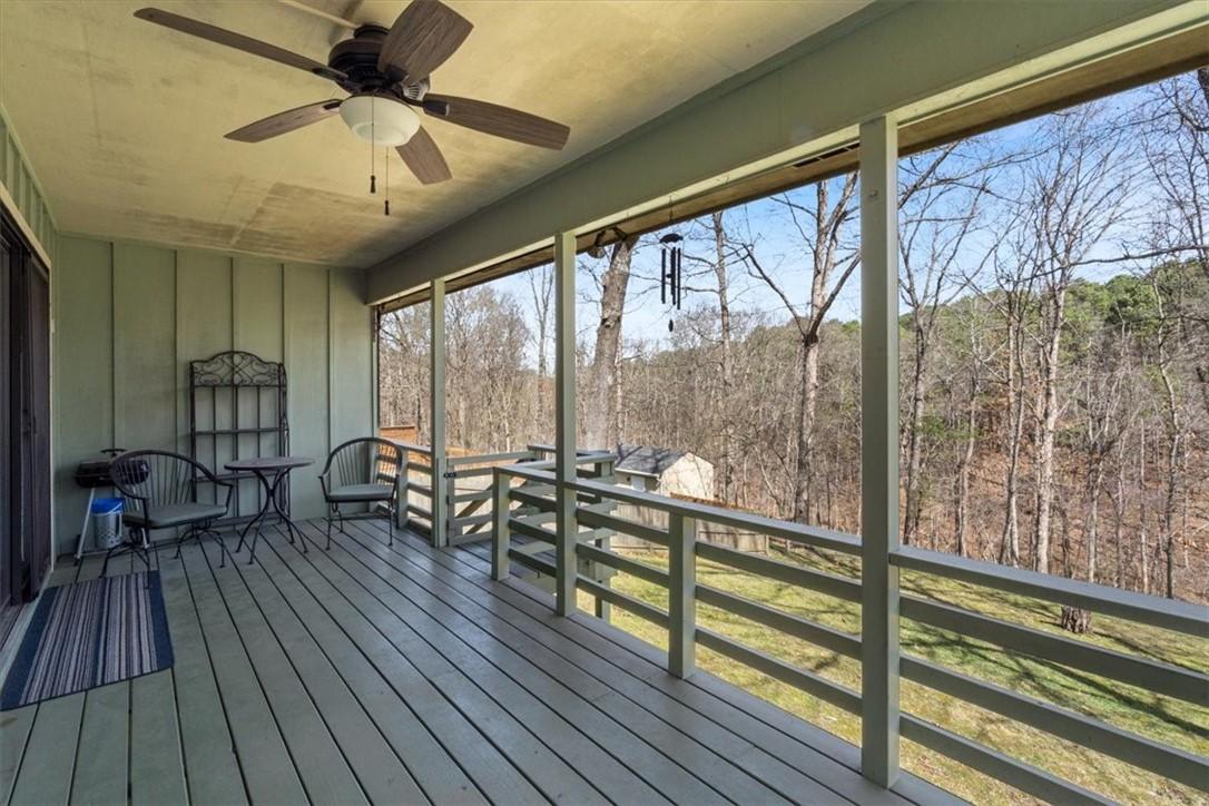 Image 4: Covered deck overlooks backyard and lots of "commo