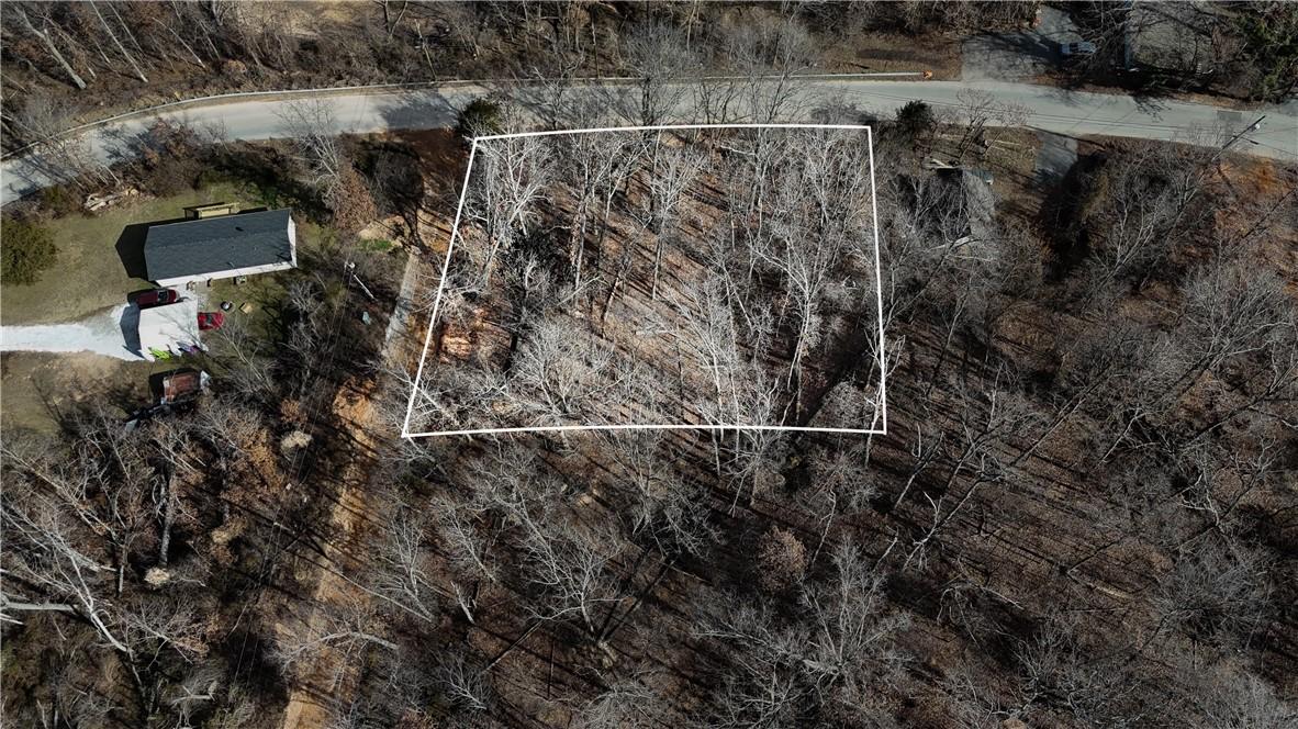 Image 2: Aerial view of property and surrounding area featu