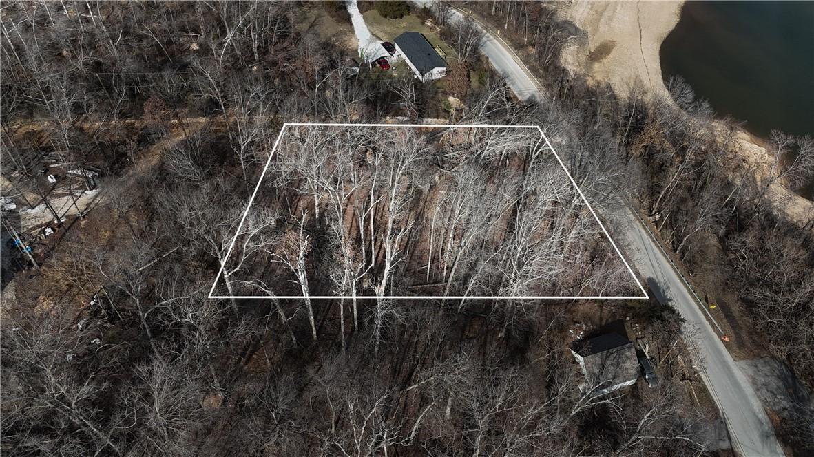 Image 4: Aerial view of property and surrounding area featu