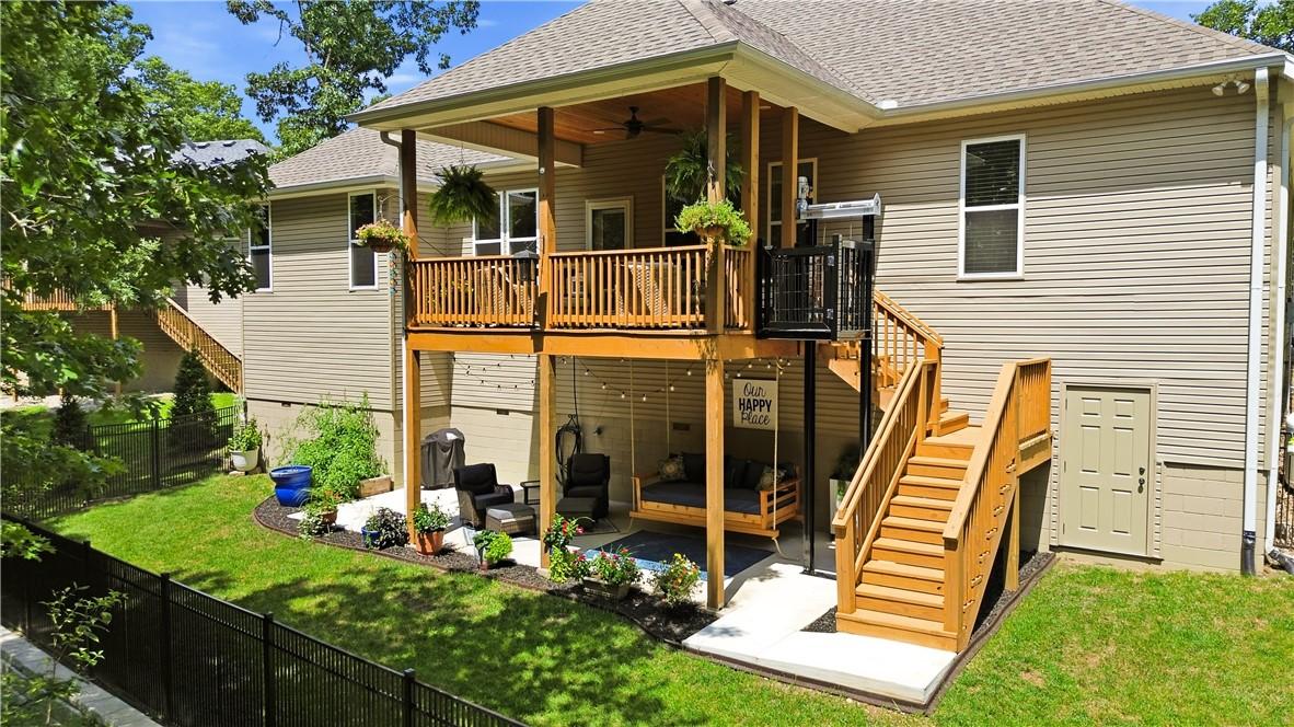 Image 3: Multi-level outdoor living spaces featuring a cove