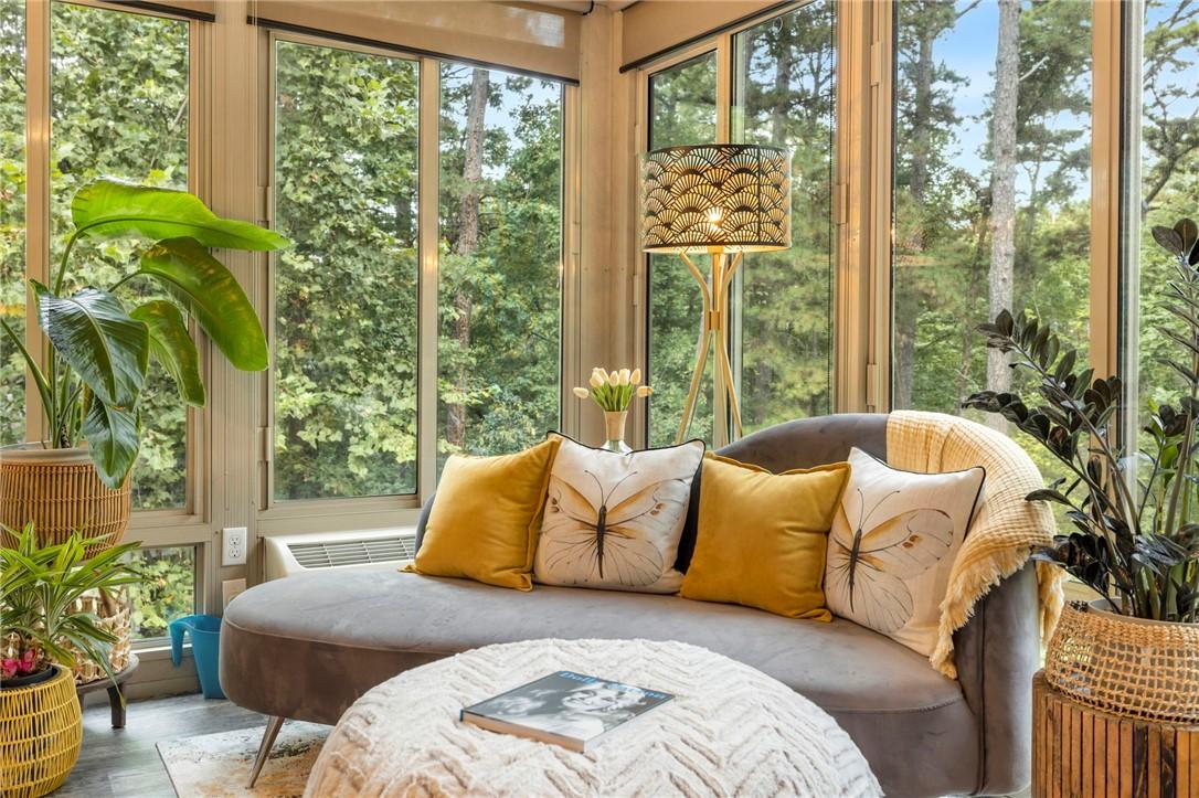 Image 2: Cozy heated/cooled sunroom.