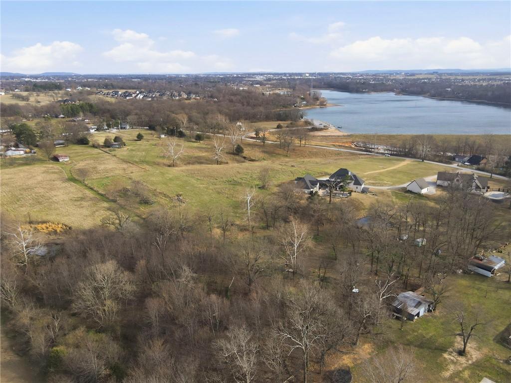 Image 4: View of rural area with a nearby body of water
