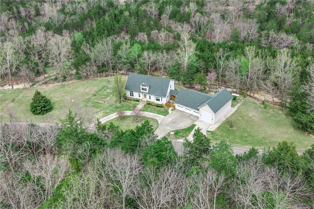 Image 2: Beautiful Holiday Island home tucked away on .82 p